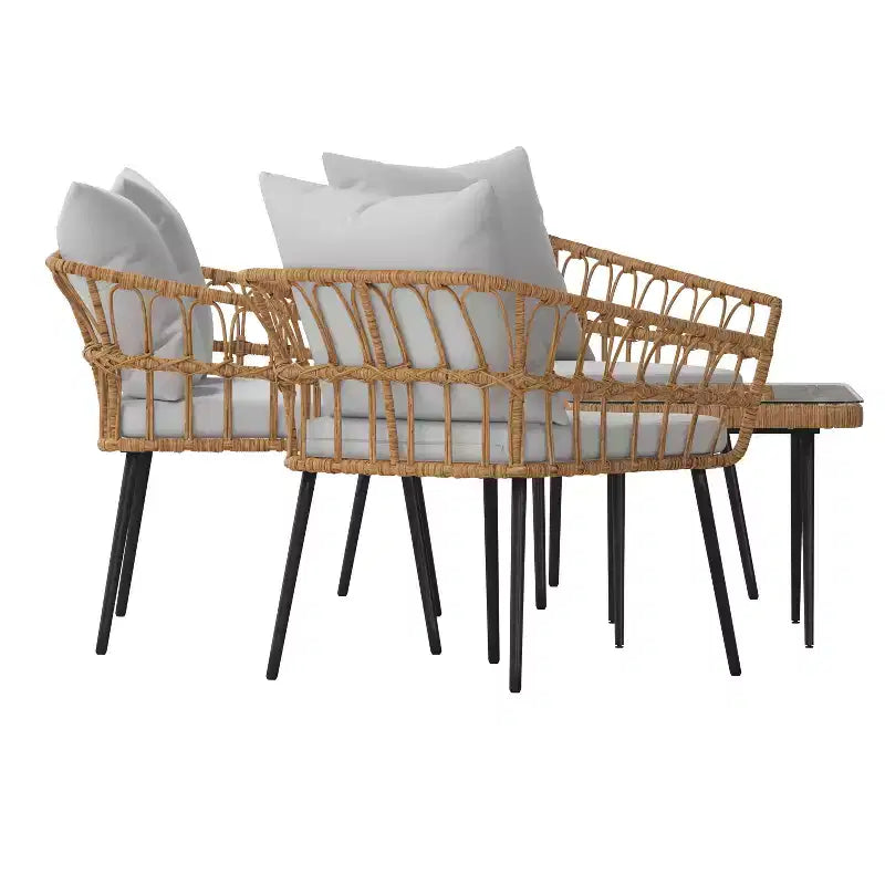 Merrick Lane vierdelige boho-patiomeubelset van natuurlijk rotan touw met open vlechtwerk voor binnen en buiten, met twee stoelen, een tweezitsbank en een tafel met kussens